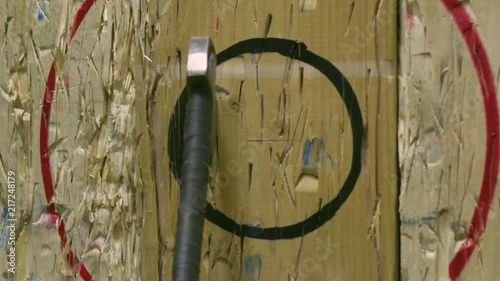 Axe Throwing Bullseye on Wooden Target in Slow Motion