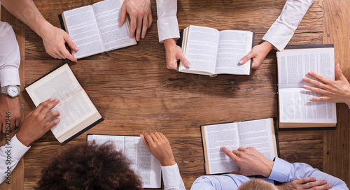 People Reading Holy Books photo