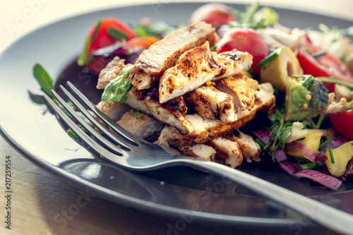 Grilled chicken salad and vegetables. Dietetic healthy food.