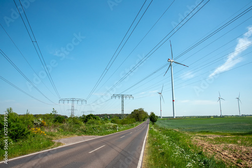 Highway, power transmission lines and wind energy plants seen in Germany © elxeneize