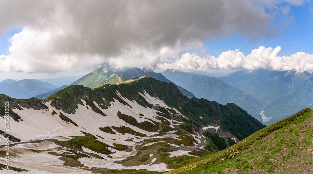 View of the snowy peaks of Rosa Peak. The Caucasus. Krasnaya Polyana, Sochi, Krasnodar Krai, Russia. View of the snowy peaks of Rosa Peak. The Caucasus. Krasnaya Polyana, Sochi, Krasnodar Krai, Russia.