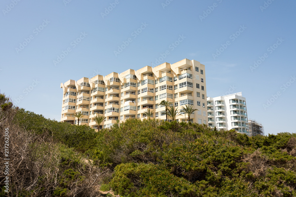 View of a large holiday hotel in the holiday resort Cala Millor on the Spanish Baleran island Mallorca