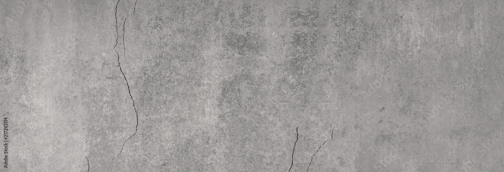 graue glatte Betontextur mit charaktergebenden Rissen und Strukturen in XXL als Hintergrund graue glatte Betontextur mit charaktergebenden Rissen und Strukturen in XXL als Hintergrund
