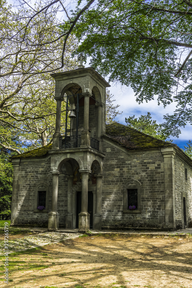 Old Church in the shade of trees