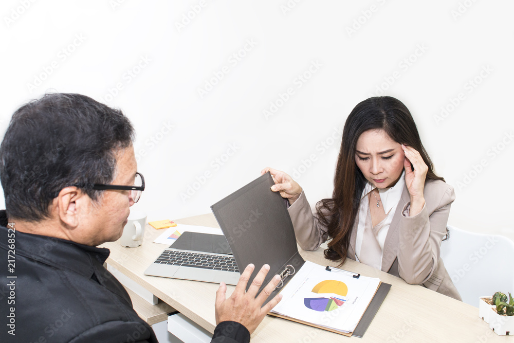 Manager businessman talking with businesswoman on office.Their are straining.Copy space. Manager businessman talking with businesswoman on office.Their are straining.Copy space.