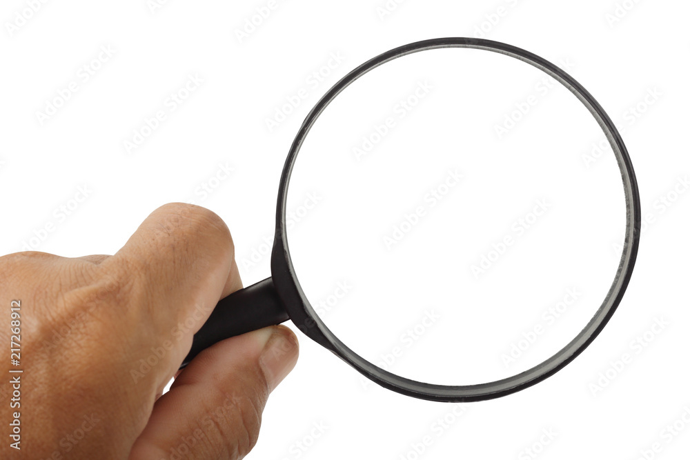 Magnifying glass in hand isolated with clipping path Magnifying glass in hand isolated with clipping path