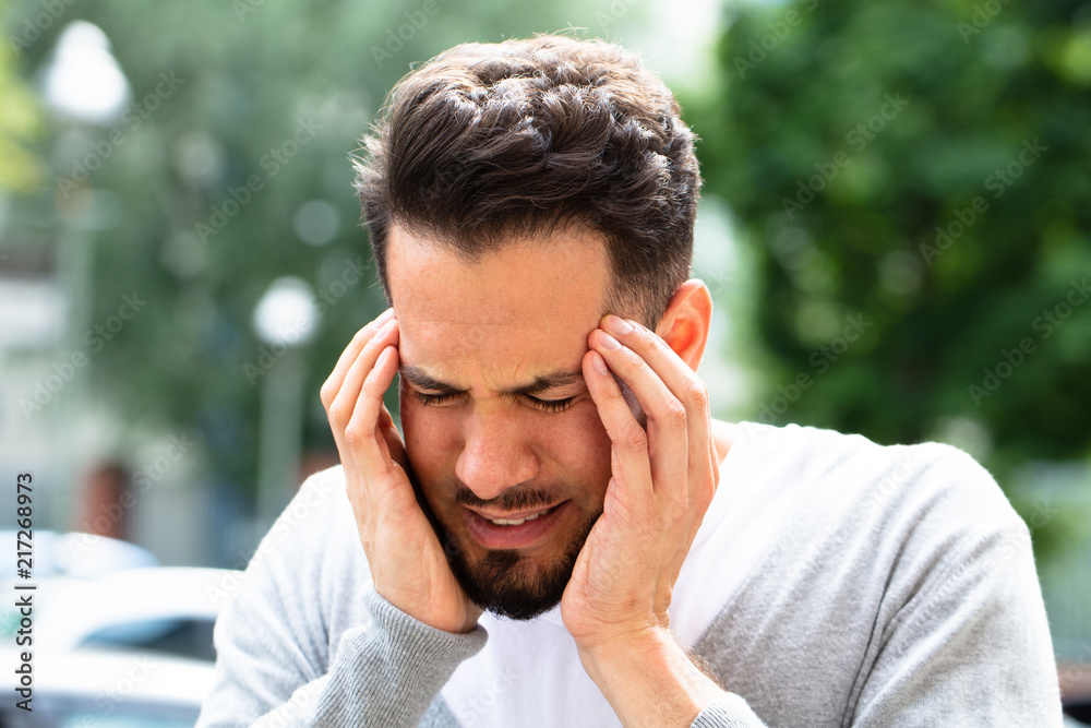 Man Suffering From Headache Man Suffering From Headache