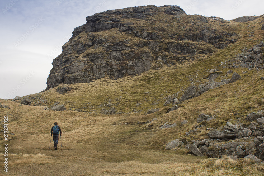 Man Climbing a Scottish Mountain 