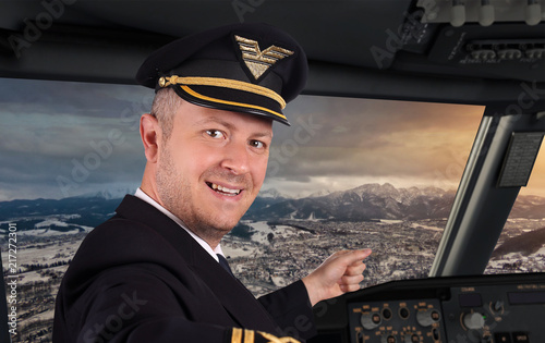 Happy pilot in cockpit