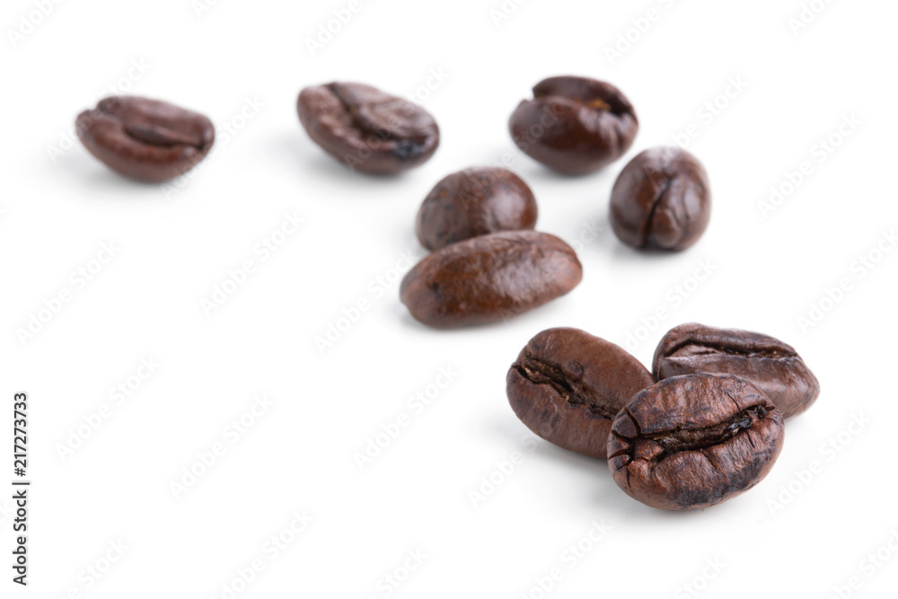 Roasted coffee beans isolated on pure white background for content using. Roasted coffee beans isolated on pure white background for content using.