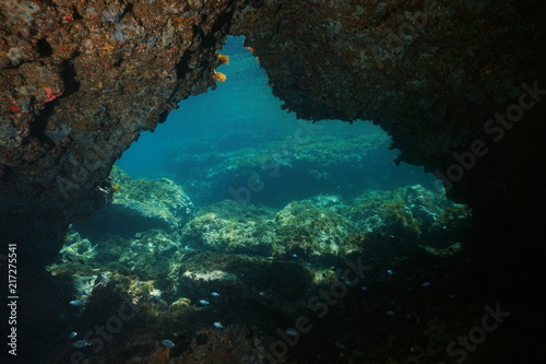 Underwater a passage below rocks in the Mediterranean sea, Cabo de Palos, Cartagena, Murcia, Spain