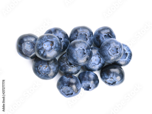 Ripe blueberries on white background