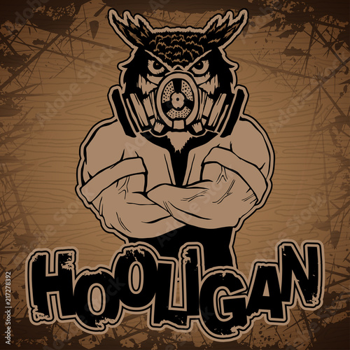 Steep fashionable owl on a wooden background.