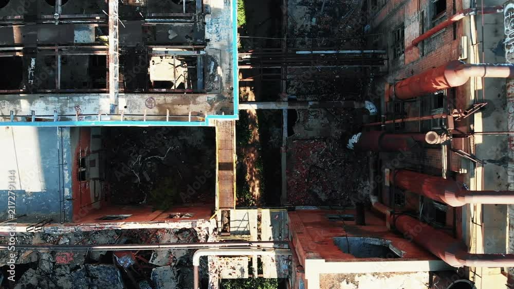 Aerial Flyover of Abandoned Sugar Mill Showing Graffiti and Destruction from Fire in Longmont Colorado Vertical Video