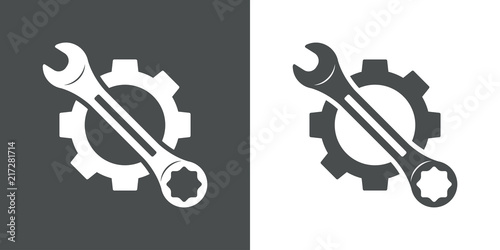 Icono plano engranaje con llave en diagonal en gris y blanco