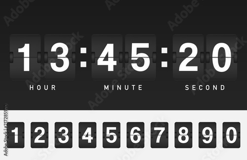 Black flip board countdown timer with white figures in airport style.