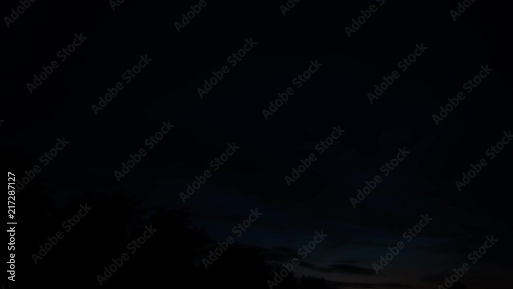Dusk Time Lapse behind trees, getting dark Dusk Time Lapse behind trees, getting dark