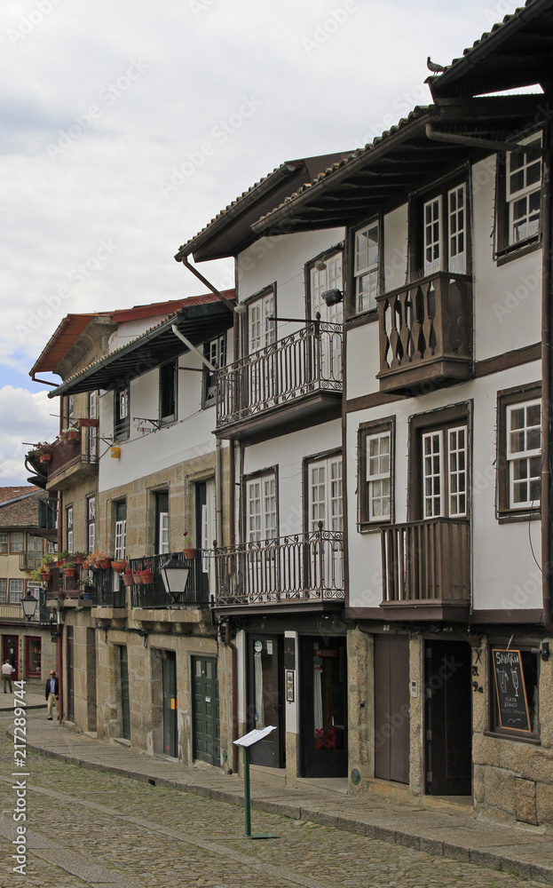 Old narrow street in portuguese city Guimaraes