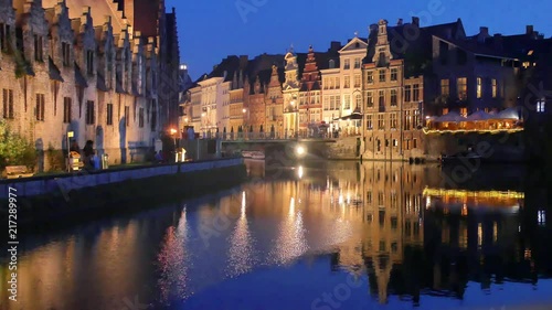 Gent, old city center illuminated at dusk, Belgium