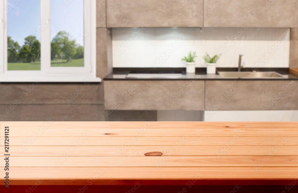 Blurred kitchen interior and desk space. Mock up Blurred kitchen interior and desk space. Mock up