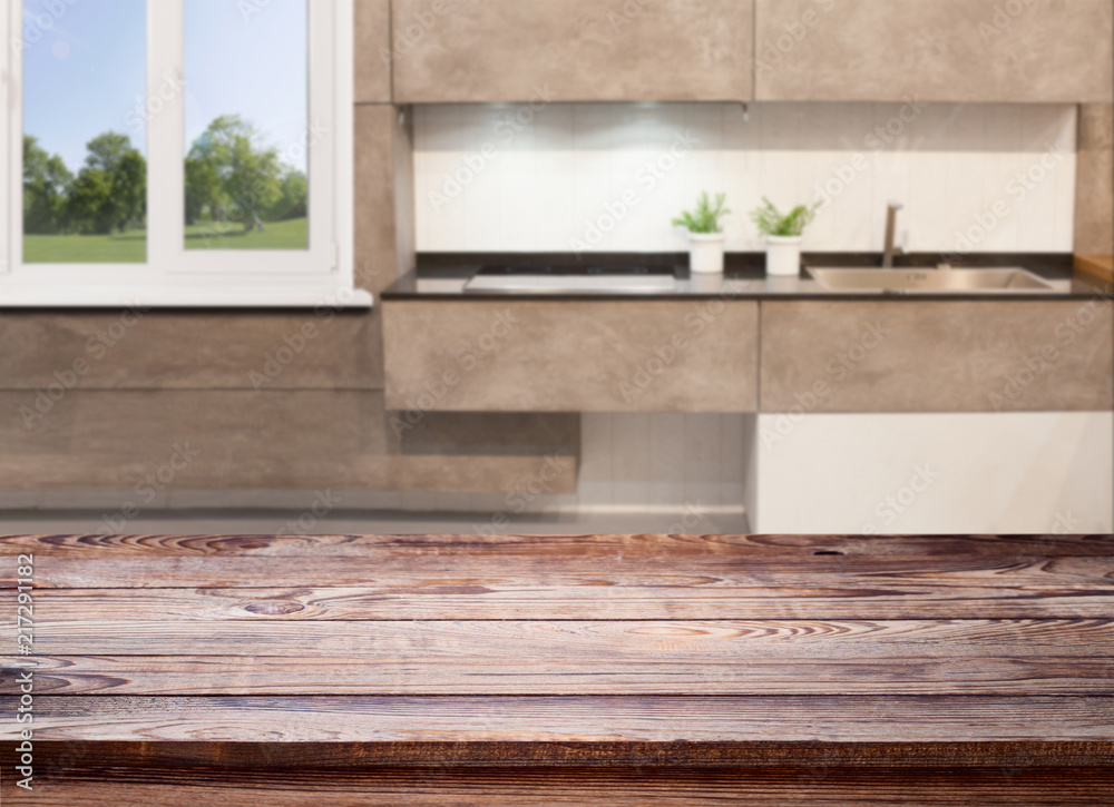 Wood table top on blur kitchen window background, banner - can be used for montage your products or foods Wood table top on blur kitchen window background, banner - can be used for montage your products or foods