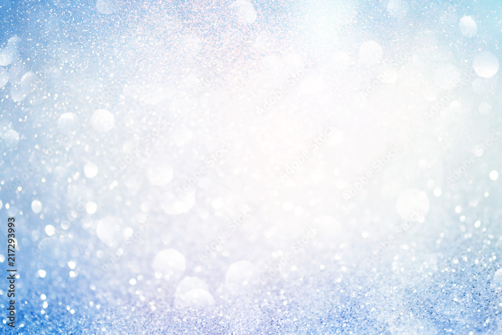 blue glittering christmas lights. Blurred abstract background blue glittering christmas lights. Blurred abstract background