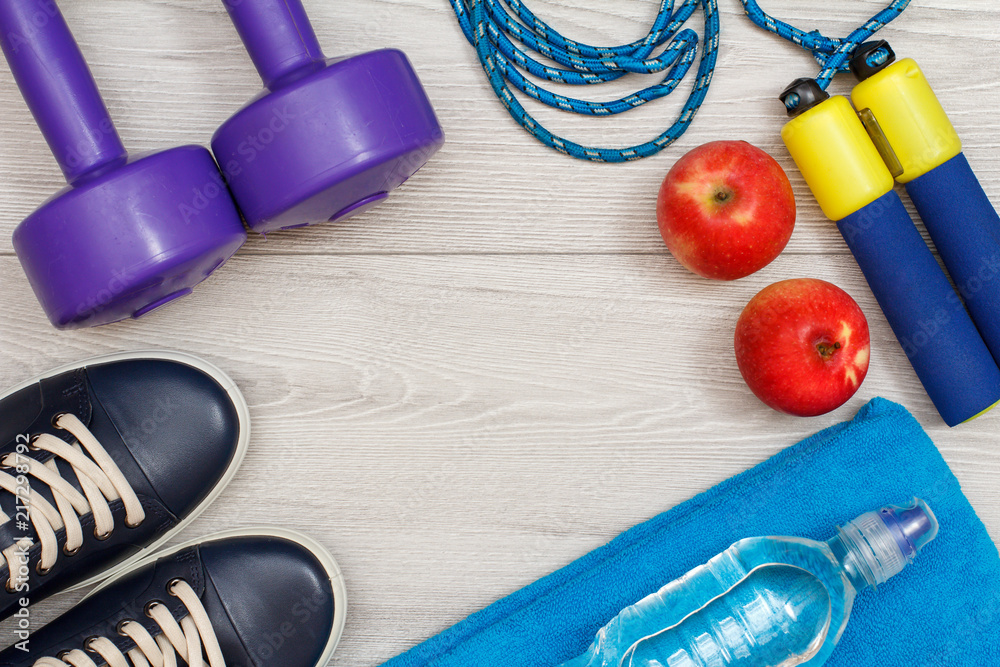 Different tools for fitness on floor in room Different tools for fitness on floor in room