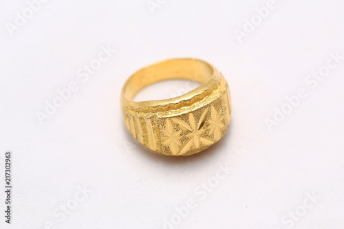 Beautiful gold ring on white background