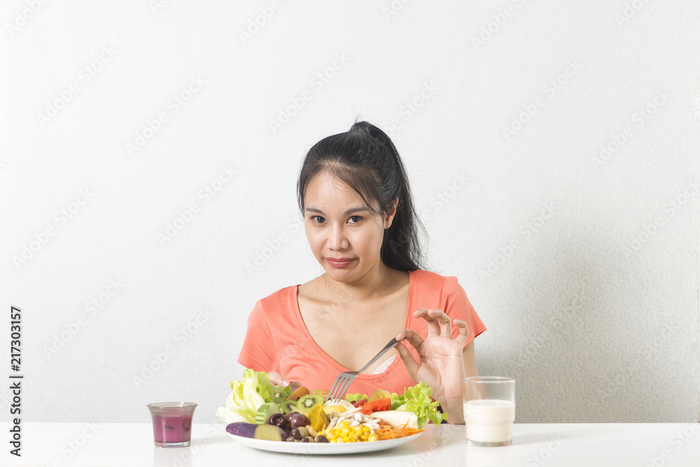  Woman does not like vegetable. Unhappy woman  does not like healthy food, Emotional face.