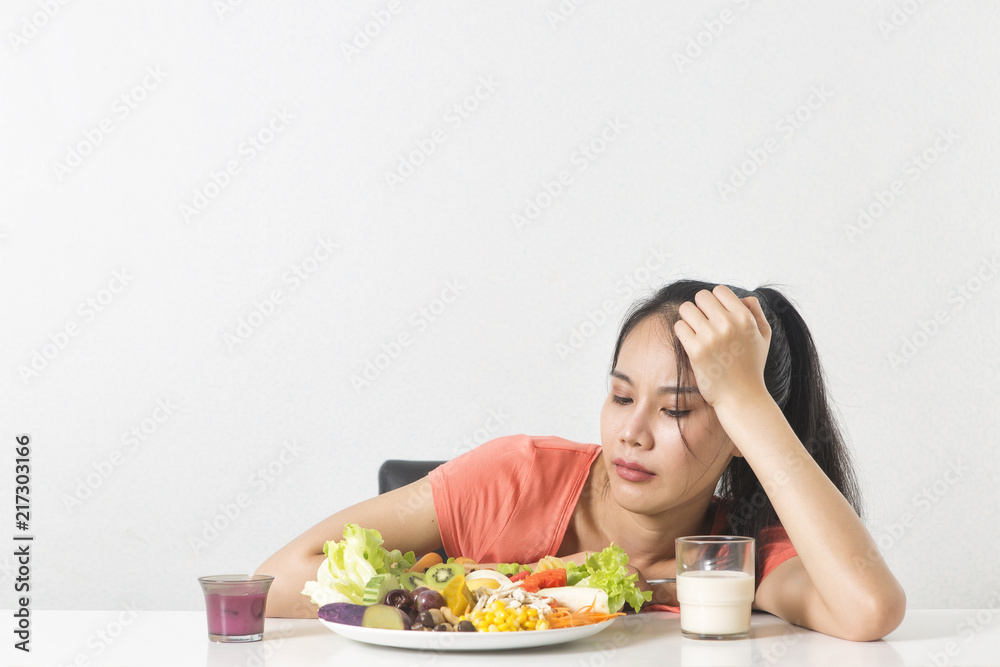 Woman does not like vegetable. Unhappy woman does not like healthy food, Emotional face. Woman does not like vegetable. Unhappy woman does not like healthy food, Emotional face.