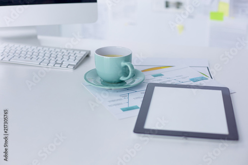 A cup of coffee on the office table