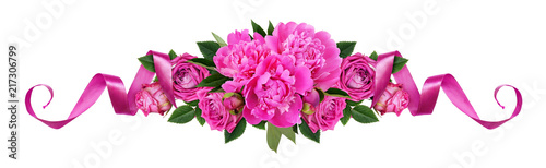 Pink peonies, rose flowers and satin ribbons in a line floral arrangement