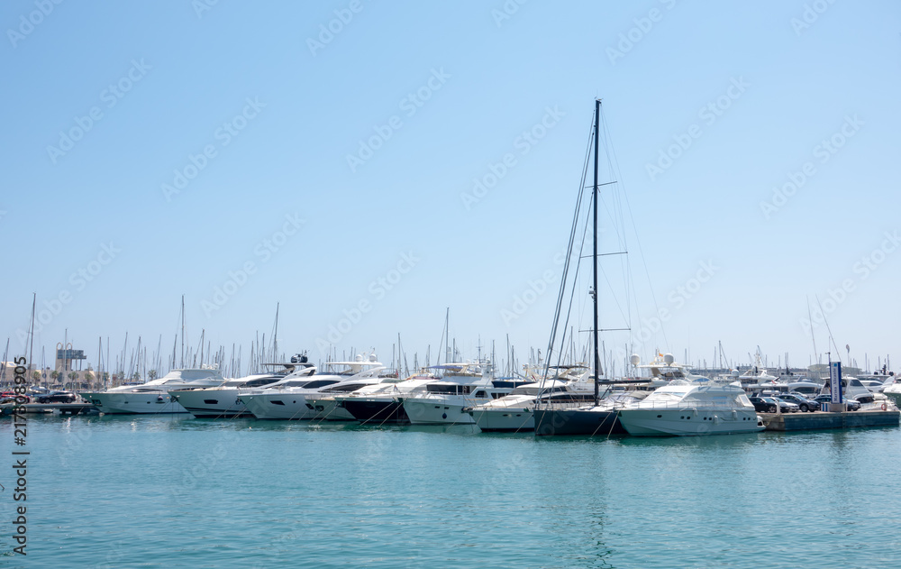 Sailing boats and yachts in mediterranean port