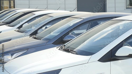 Selling and renting cars concept. Row of cars