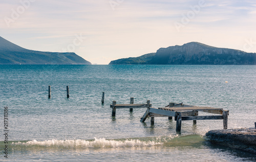 Abandoned wooden pier in Gialova sea lagoon, Peloponnese, Greece. photo