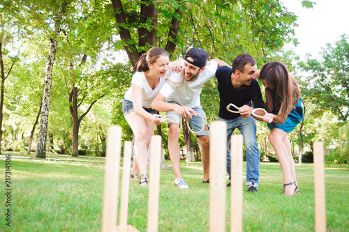 Outdoor games - ring toss. © nagaets