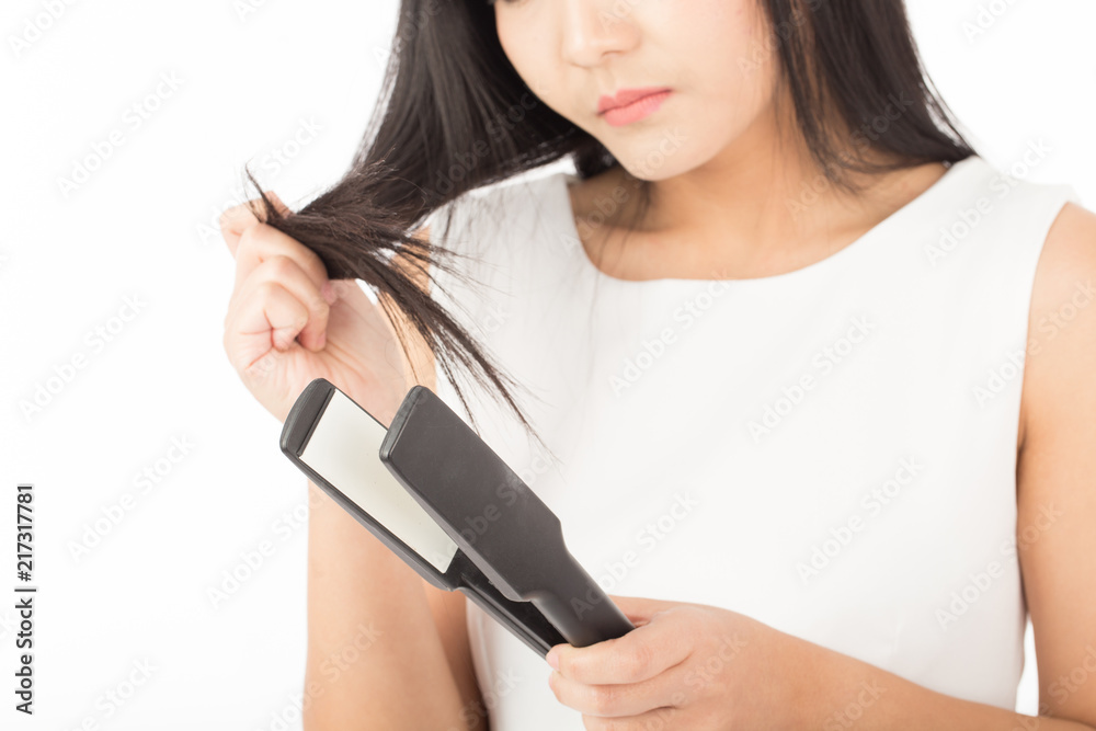 woman holding hair dryer and looking damaged hair she so serious and worries,Isolated on white background,Haircare Concept woman holding hair dryer and looking damaged hair she so serious and worries,Isolated on white background,Haircare Concept