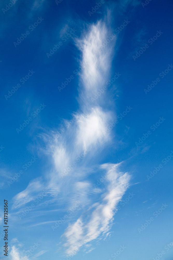 Simple cloudscape with bright blue sky Simple cloudscape with bright blue sky