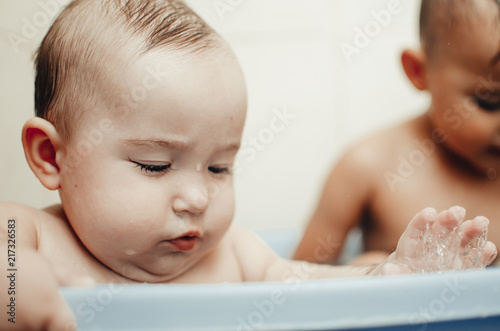 children, brother and sister in the bathroom photo