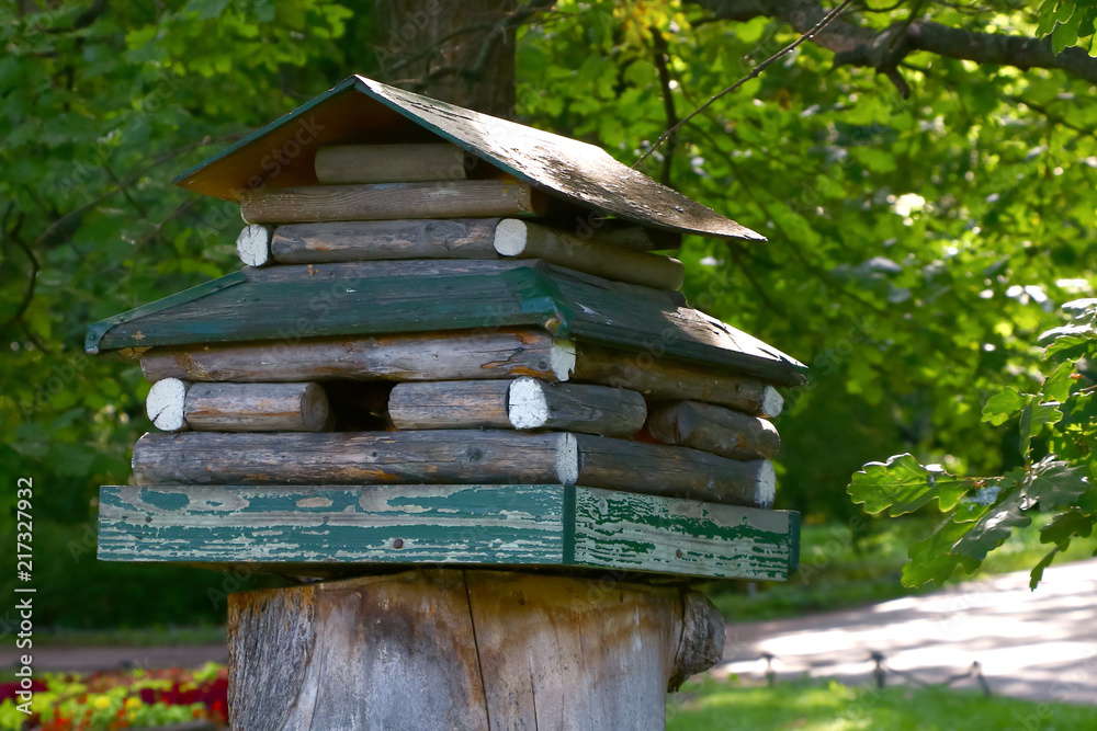 birdhouse in the form of a wooden house birdhouse in the form of a wooden house