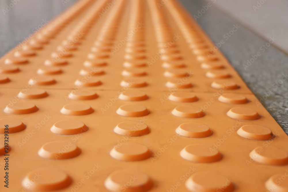 Tactile paving is a system of textured ground surface indicator found ...