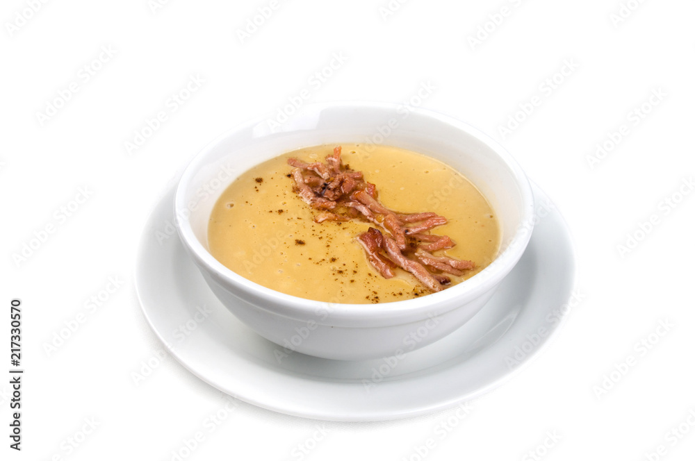 bowl of broccoli and green peas cream soup isolated on white background bowl of broccoli and green peas cream soup isolated on white background