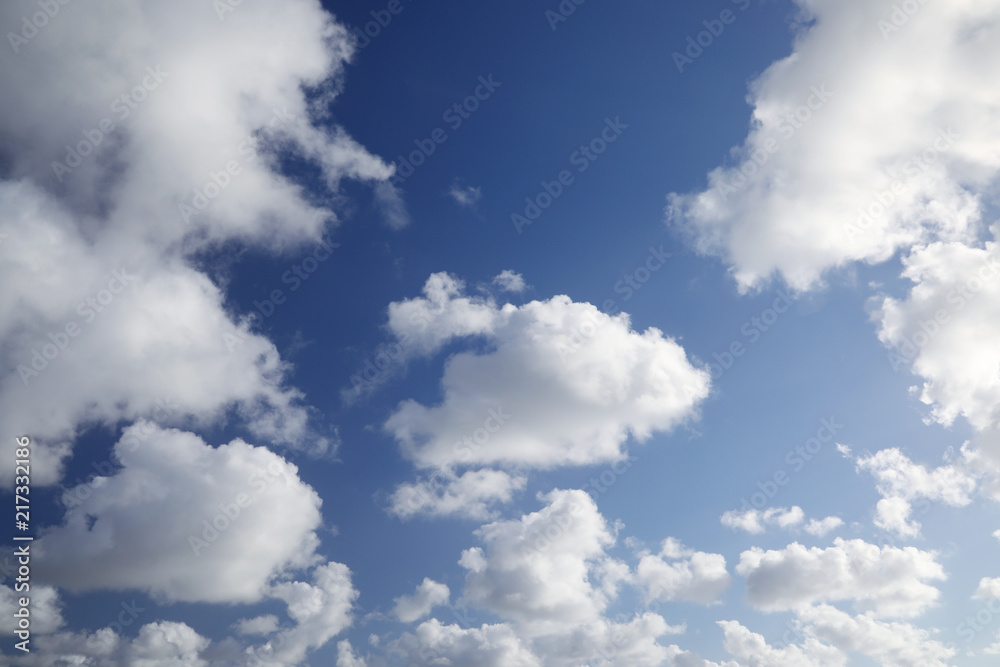 Fototapeta premium White clouds on a blue sky on a sunny day