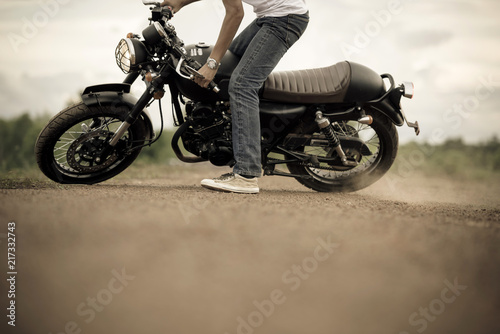 Motorcycle or motorbike spot with male rider.
