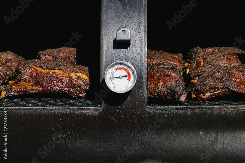 Beef briskets in a smoker photo