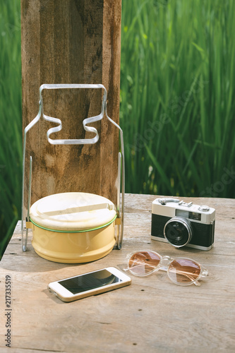 Accessories on wooden desk background photo