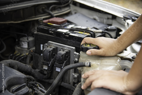 Professional mechanic is checking for engine malfunction