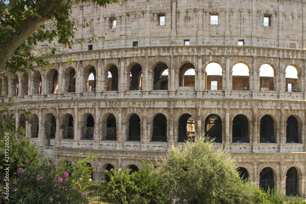 Naklejka premium Detail of the Colosseum, known as Amphitheatrum Flavium, symbol of the city of Rome, of Italy and one of the seven wonders of the world. In ancient times it was used for gladiatorial shows.
