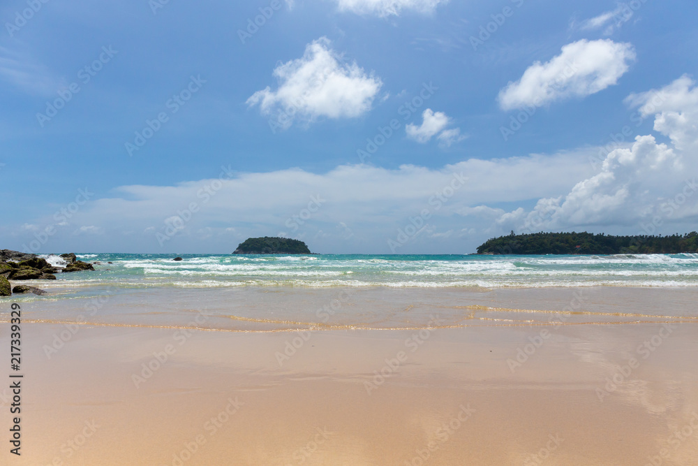clean and clear sea water with blue sky background at Kata beach, Phuket island of Thailand