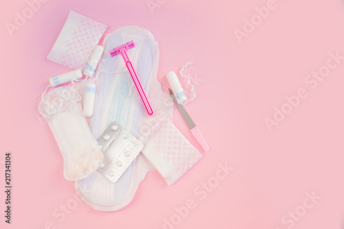 women's pads on a pink background. Critical days for a woman, menstruation 